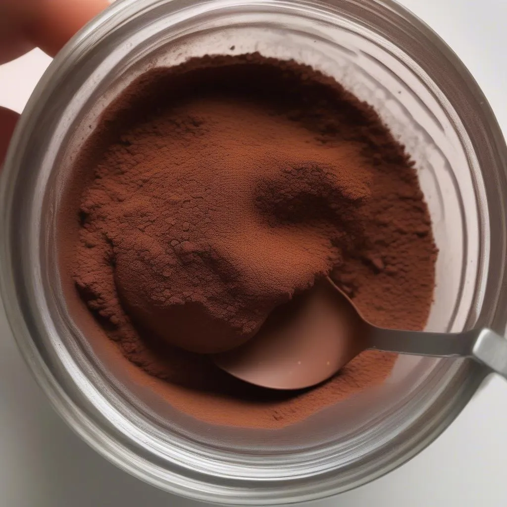 50g cocoa nguyên chất trong chén 