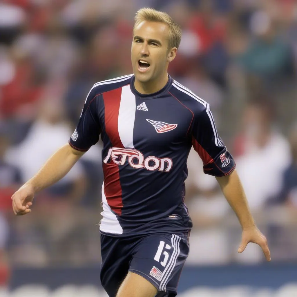 Hình ảnh Taylor Twellman trong màu áo CLB New England