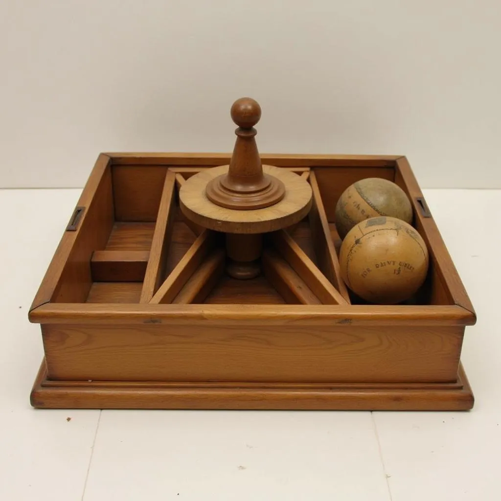 A cup and ball set from the early 1900s, highlighting the history and enduring popularity of the game.