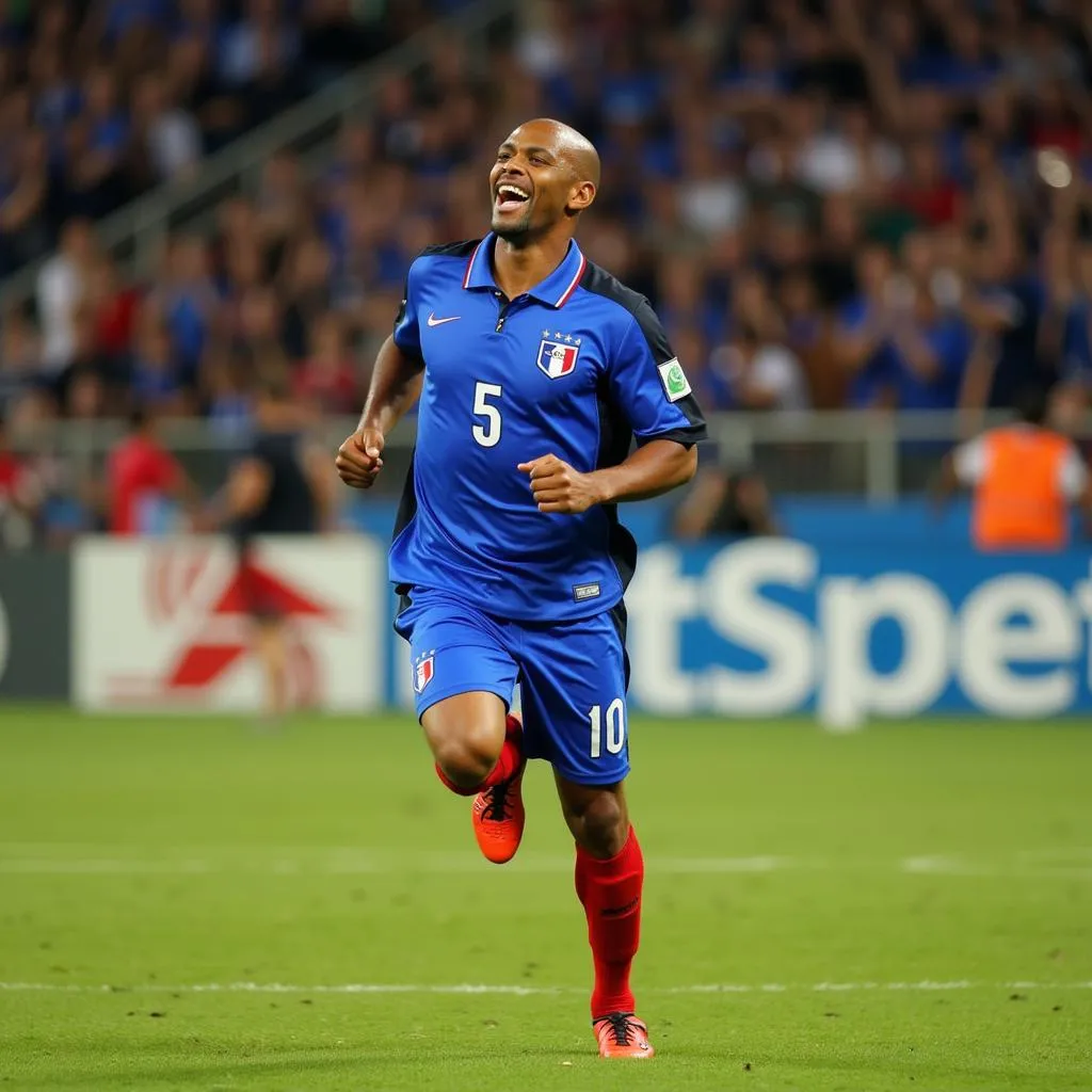 Patrick Vieira celebrates a goal during the 2006 World Cup