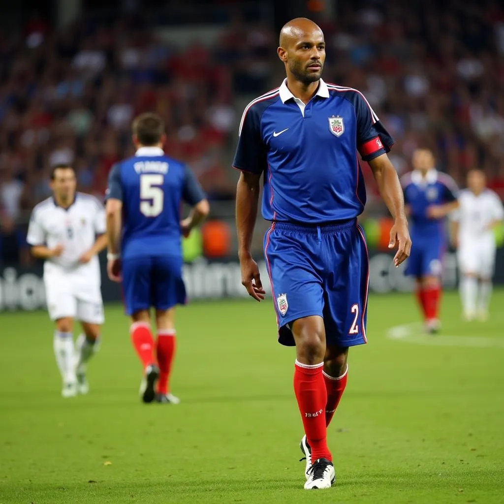 Patrick Vieira leads the French team during a match in the 2006 World Cup